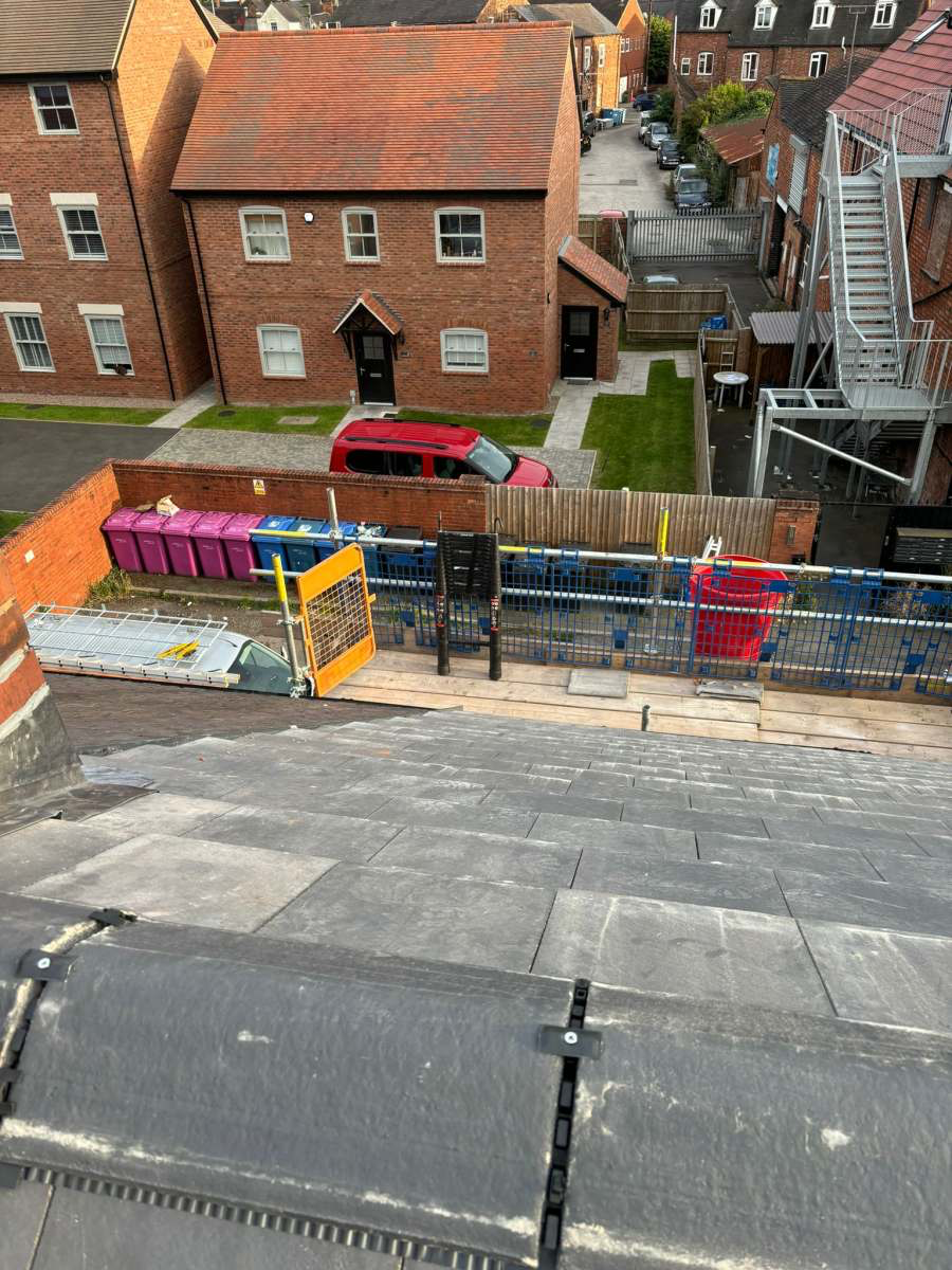 Aerial view of a completed slate re-roof over a Staffordshire street